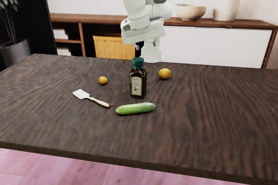 A generated scene: a salad dressing bottle, a cucumber, a spatula and two oranges on a wooden table below a robot gripper, in a living-room setting.